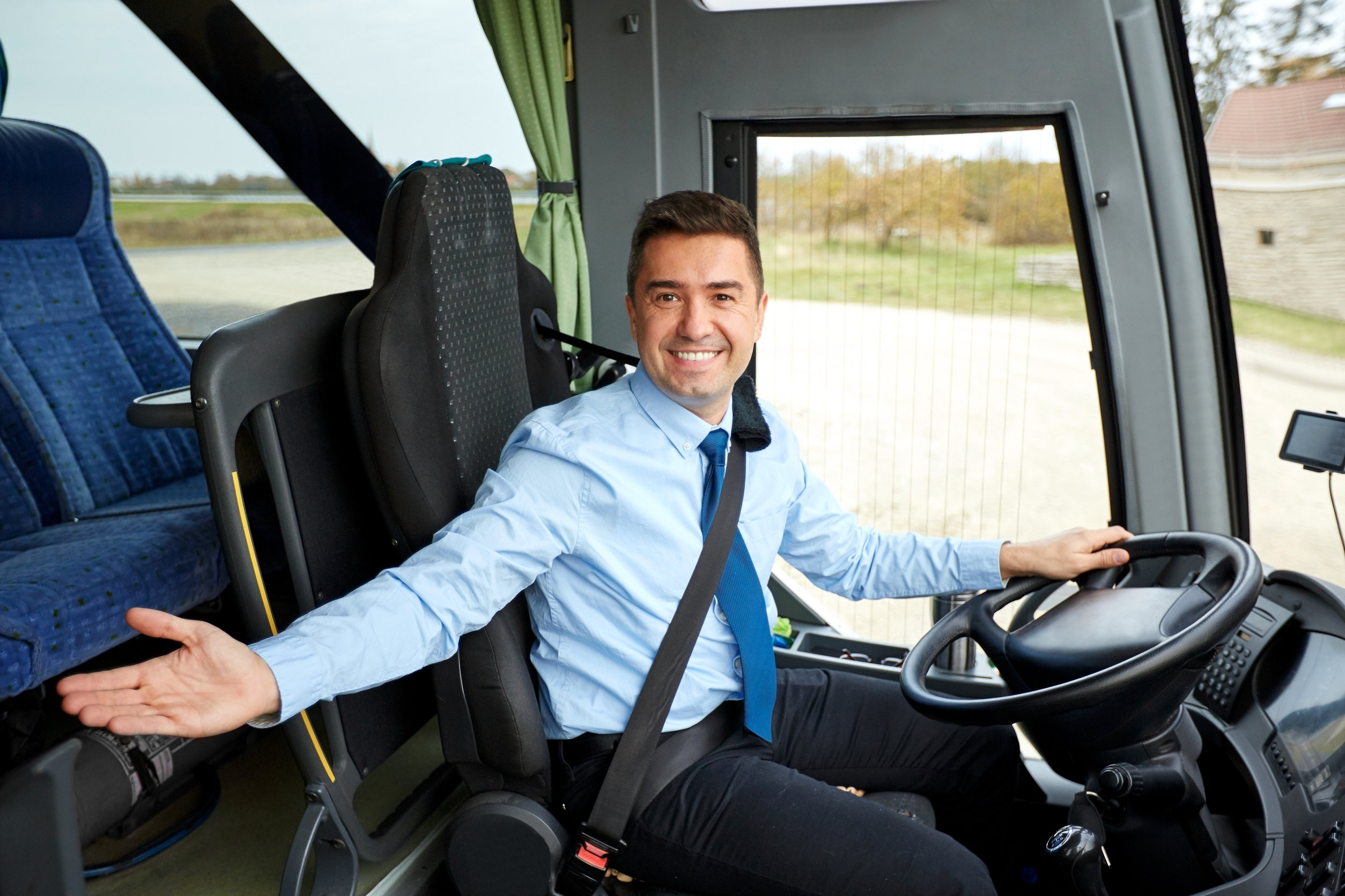 transport, tourism, road trip, gesture and people concept - happy driver inviting on board of intercity bus